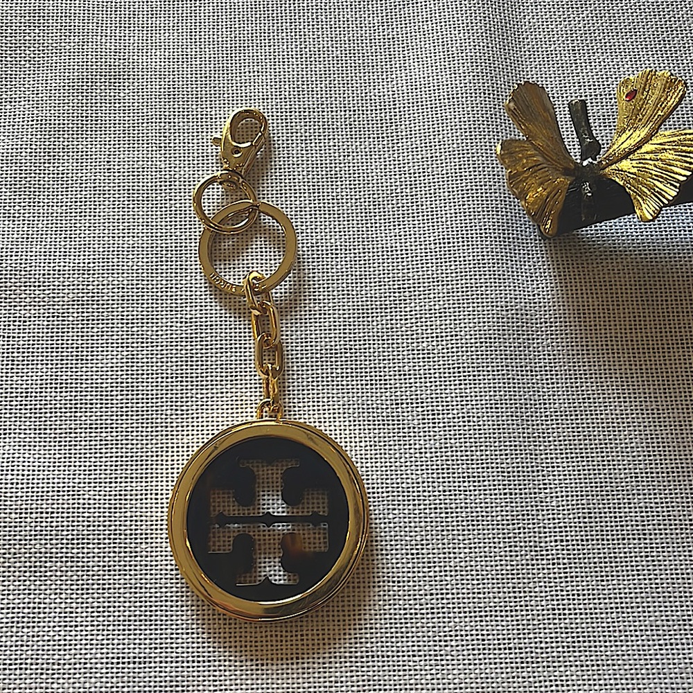Tory Burch Gold Chain and Tortoise Color Logo Key Chain. Great Condition